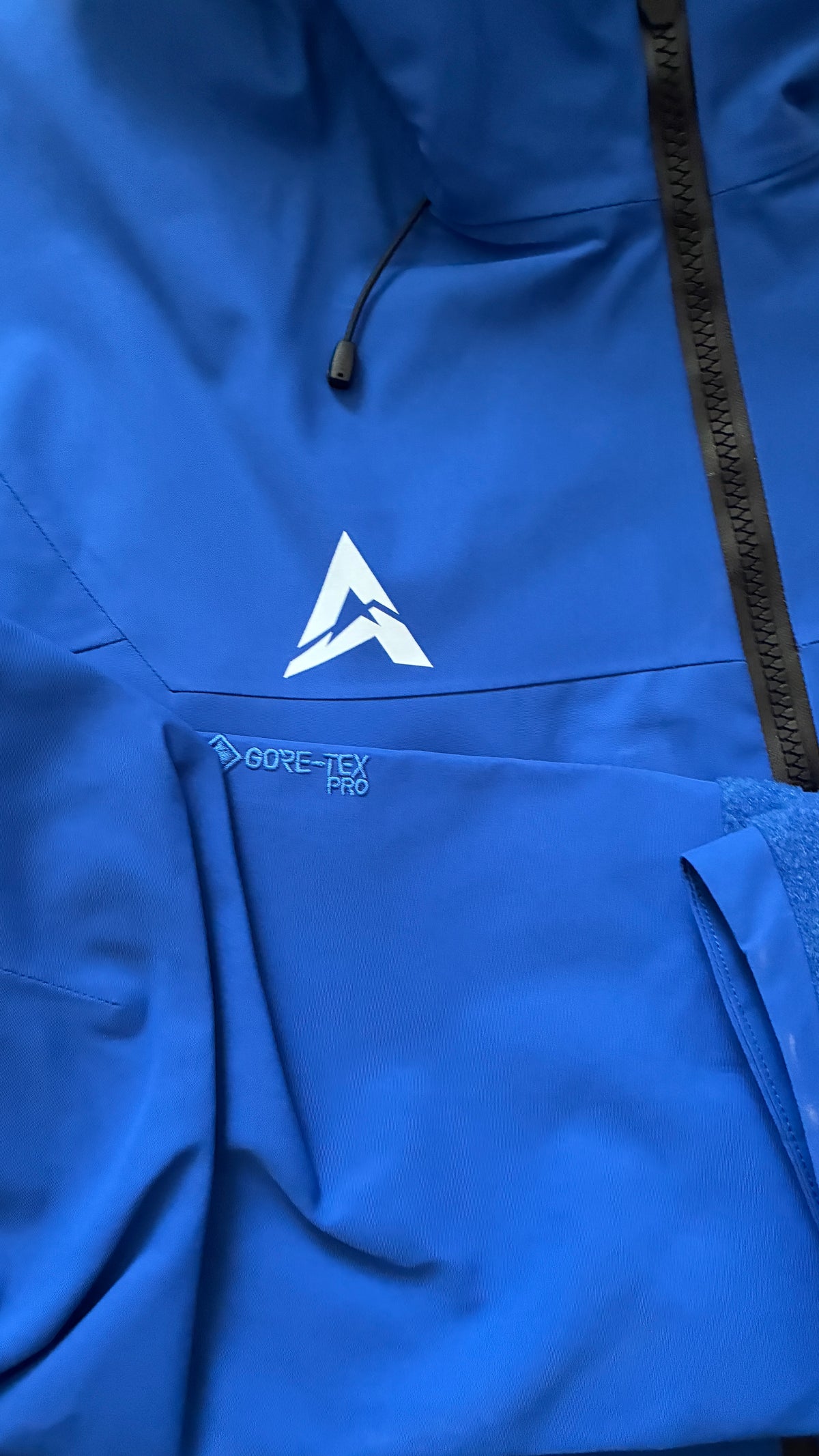 Alpine Shell azul detalle