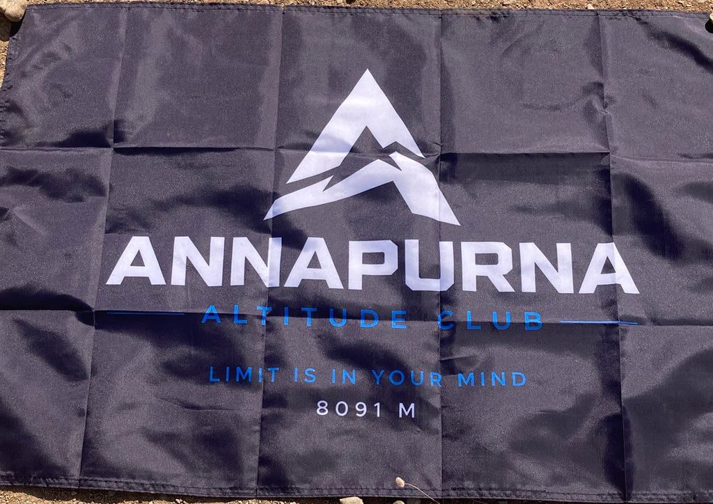 Bandera Annapurna Peak Flag doblada, detalle de tela